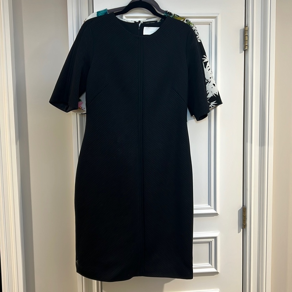 Lightly worn classy black sheath dress with chevron ribbed design- great LBD